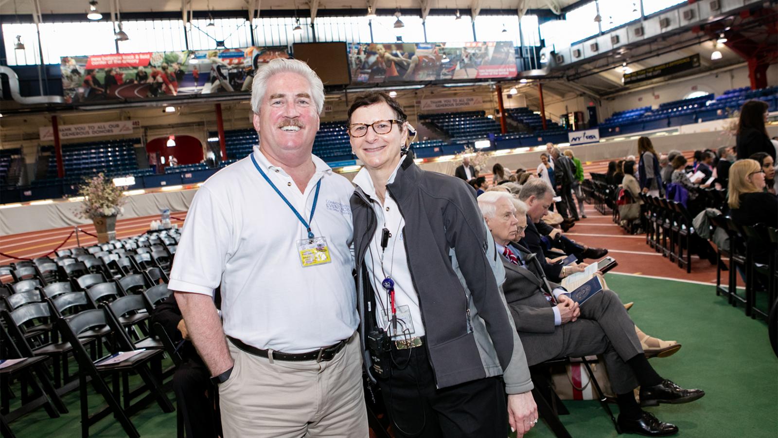 Commencement volunteer ushers in the Armory seating area