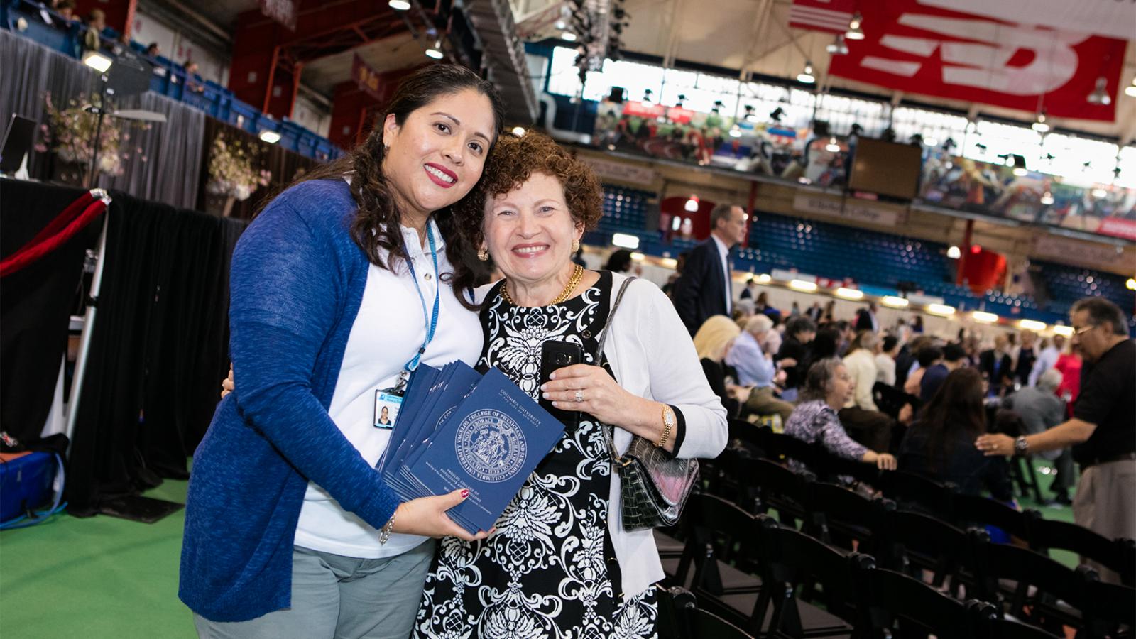 Commencement volunteer usher with guest