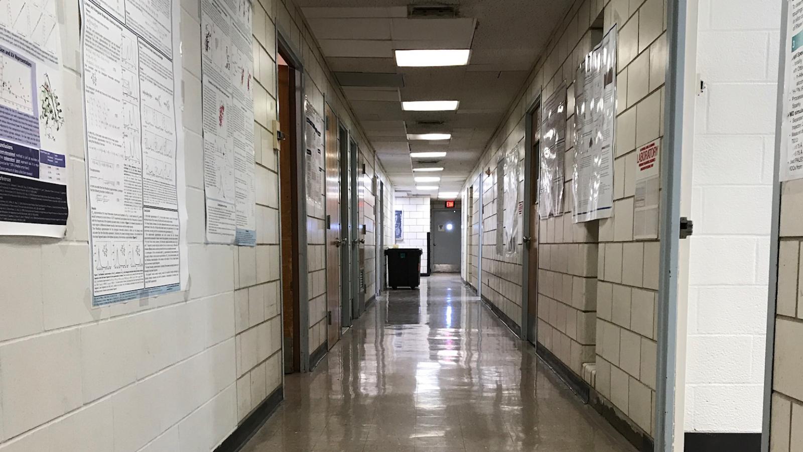 Black Building corridor poorly lit