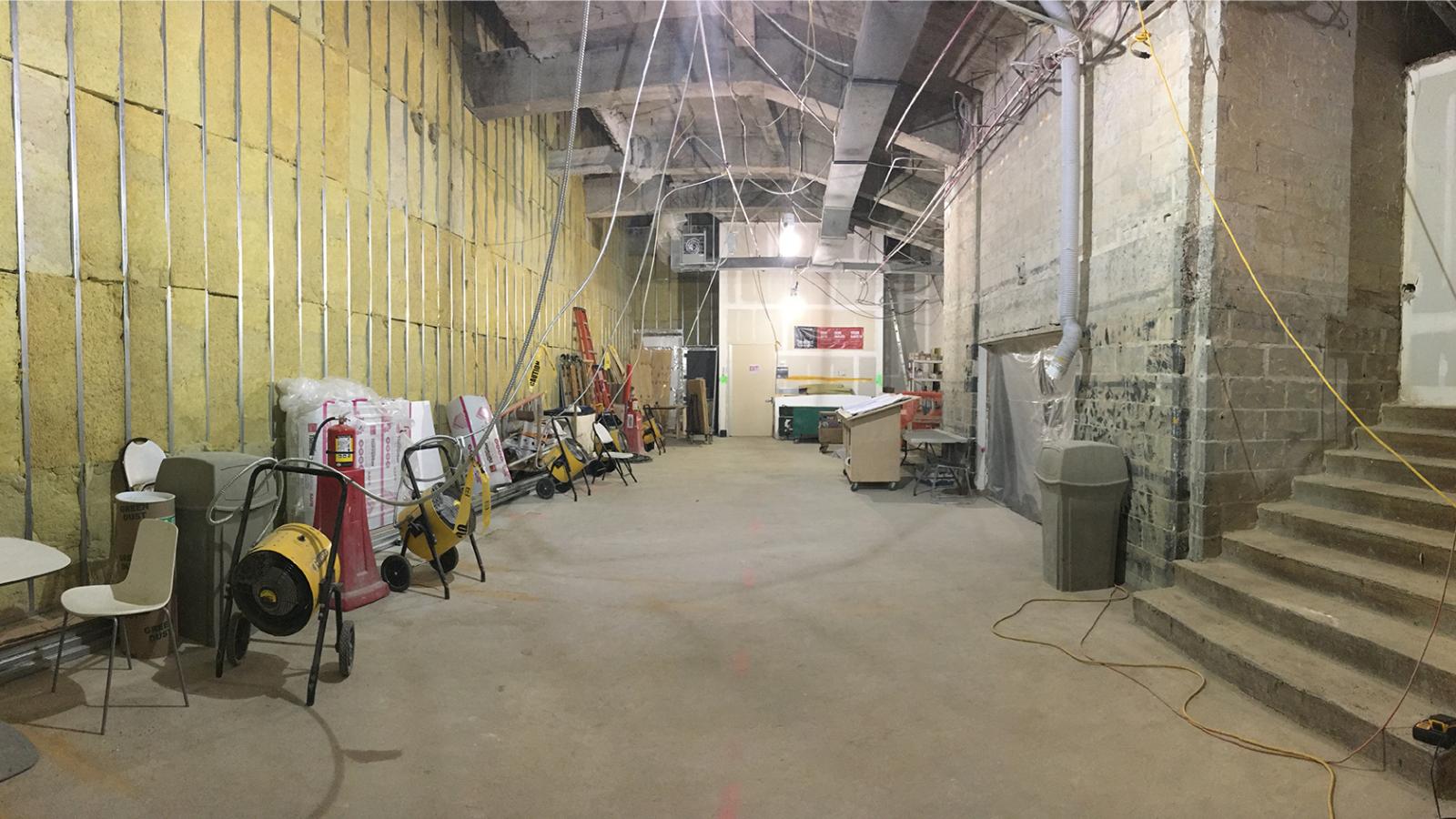 interior of Alumni Auditorium lobby progress