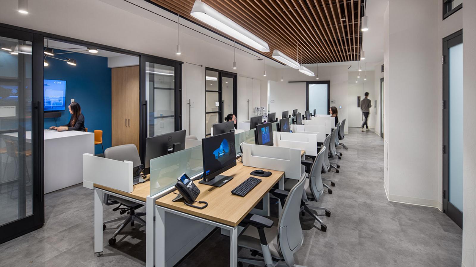 Approximately 12 work stations and two offices