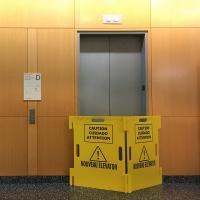 An elevator lobby in Hammer Health Sciences Center, with one elevator blocked off for work